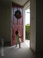 Child at the door - christmas photo