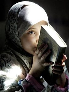  Child recites from the Koran