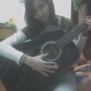 me with my huge guitar :P Roxyn photo
