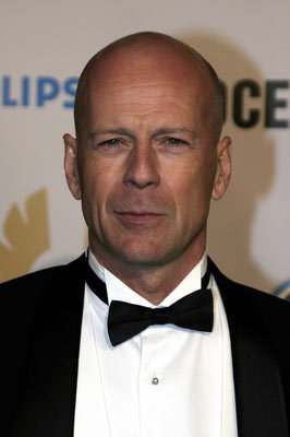 Bruce Willis wearing a bow tie
