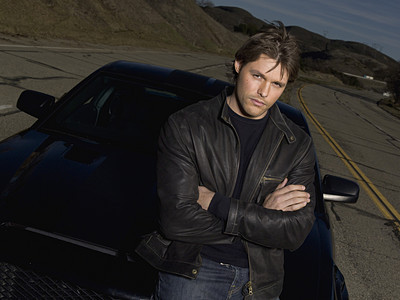  Justin Bruening as Mike Tracer